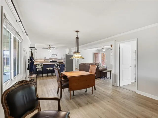 Bright, open living area seamlessly connects to the kitchen, offering modern comfort and ample space.