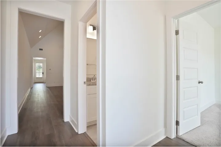 Front Entryway, and entrances to guest bathroom and guest bedroom