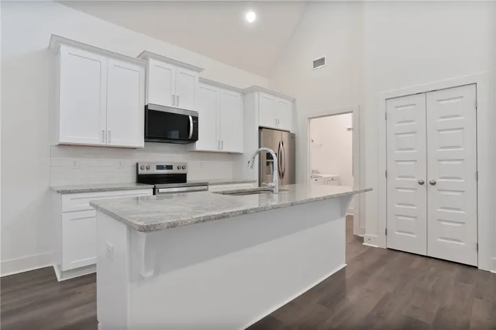 Kitchen, and entrance to laundry room