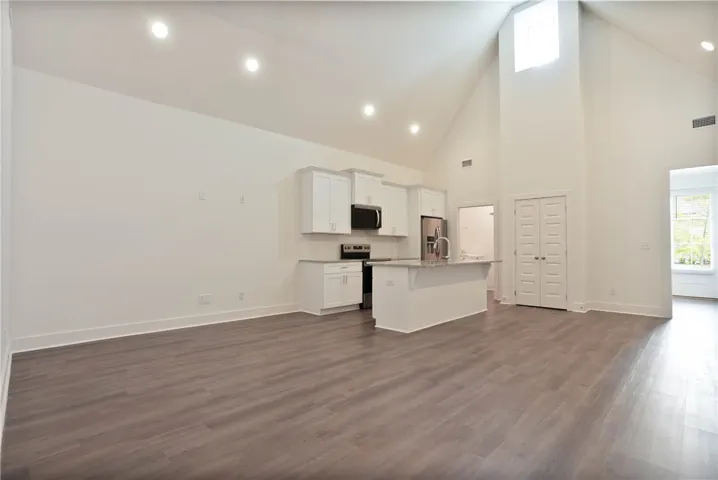 Kitchen, living, and dining.