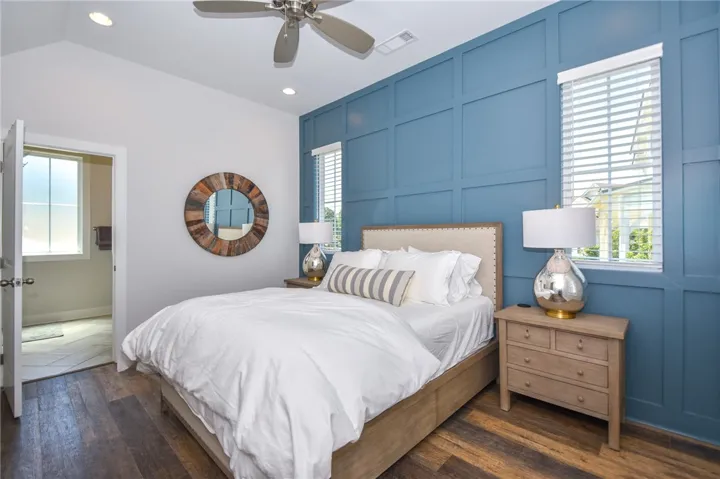 An inviting bedroom with board and batten accents offers a peaceful retreat.