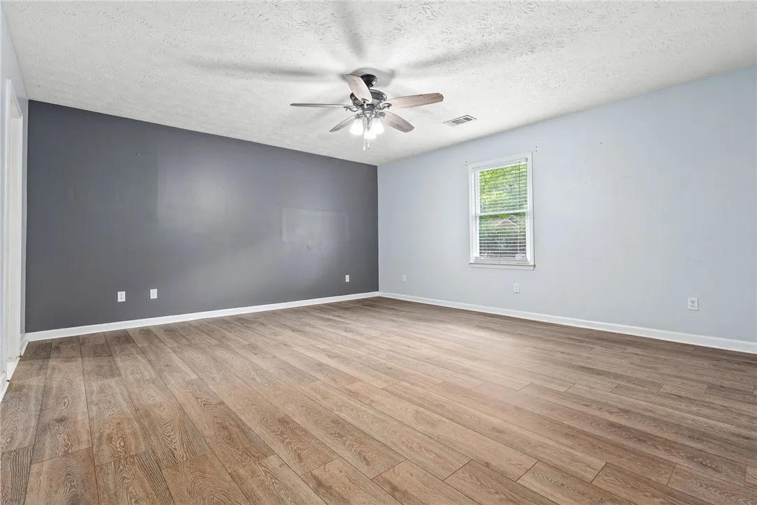 Primary Bedroom - New LVP flooring.