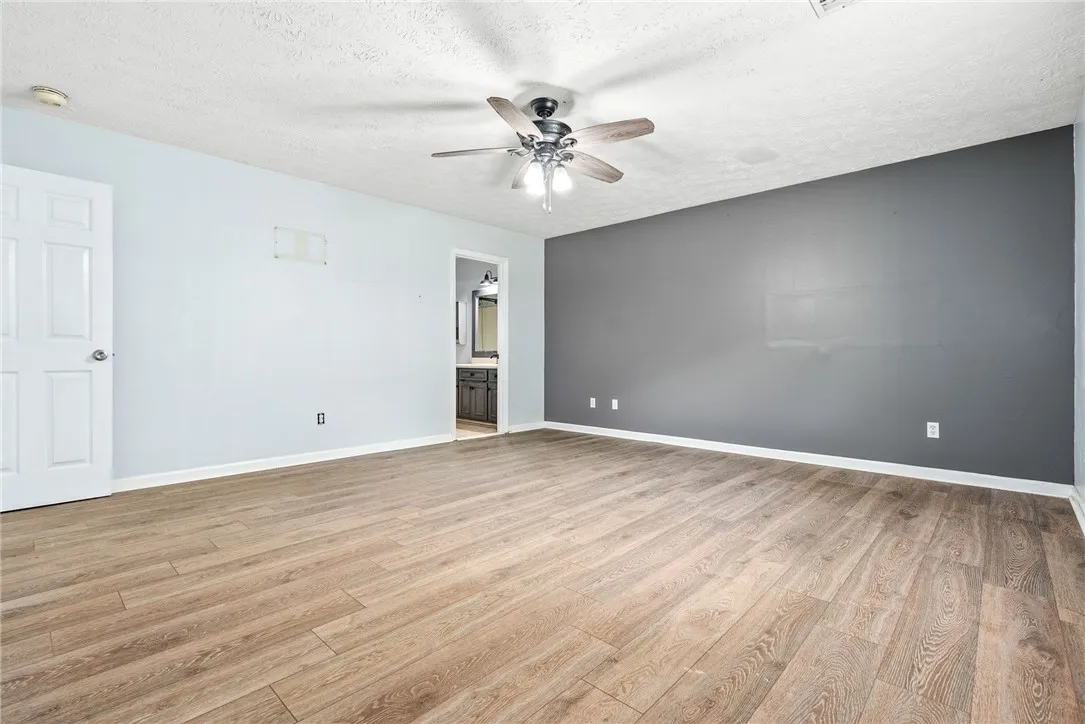 Primary Bedroom - New LVP flooring.