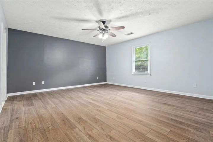 Primary Bedroom - New LVP flooring.