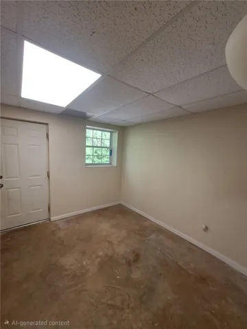 This versatile room offers ample space, a window, and convenient exterior access.
