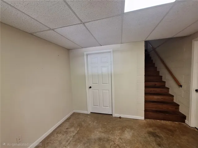 This spacious basement offers versatile potential with direct access to upper levels.