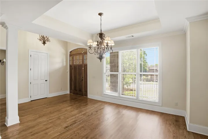 This inviting space features classic design elements and a view of the outdoors.