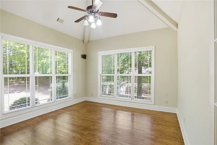 This airy bonus living space features lustrous hardwood floors and abundant natural light.