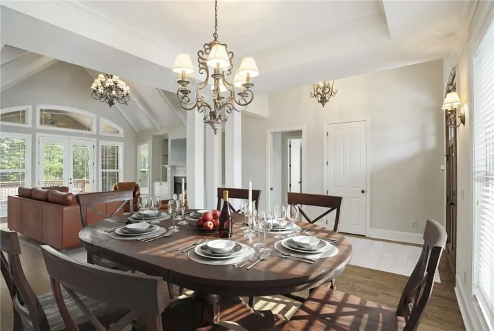 This inviting dining area seamlessly connects to the living room, creating an open and airy atmosphere. Virtually Staged.