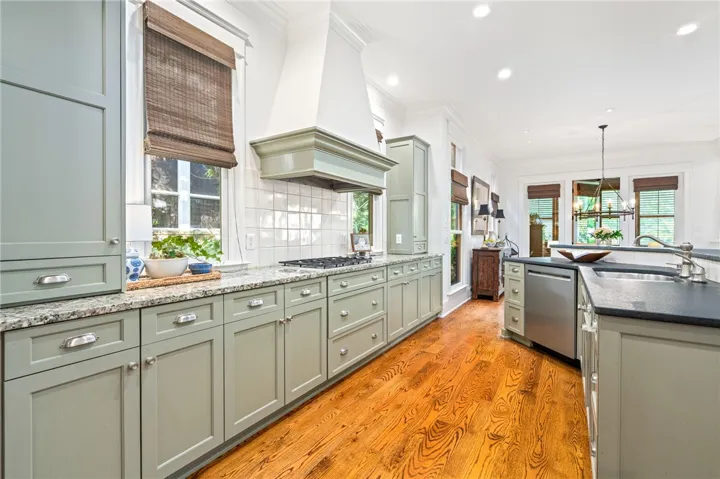 Custom kitchen cabinetry and KitchenAid appliances add to the luxurious feel of the space.