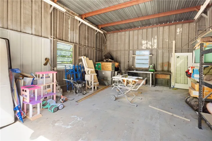 This spacious storage area offers ample room for tools, equipment, and personal belongings.