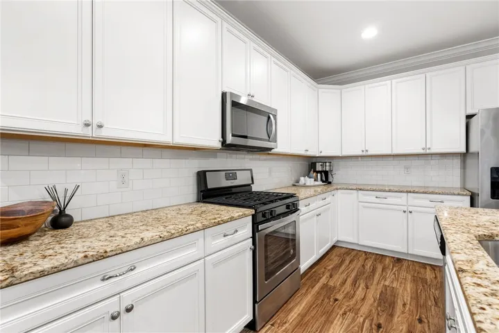 This bright kitchen features ample counter space and modern appliances for everyday living.