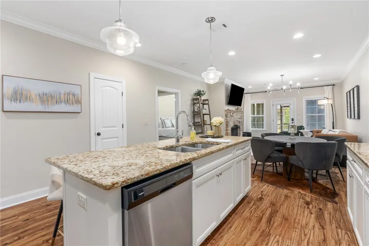 This inviting space features a well-appointed kitchen island, perfect for entertaining and everyday living.