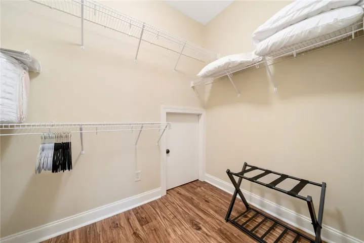 This versatile space provides ample storage with integrated shelving and durable flooring.