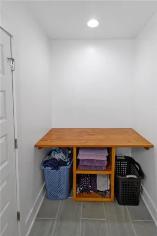 Built in folding table and storage in the primary bathroom