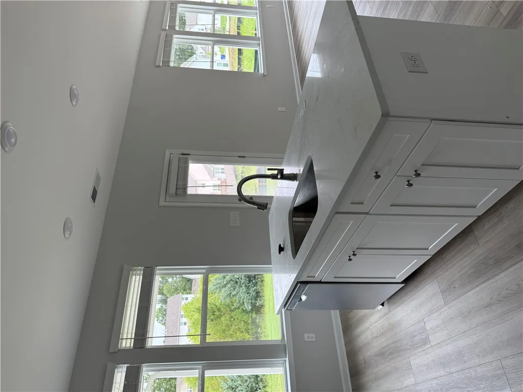A well-appointed kitchen island offers generous counter space and seamless entertaining.