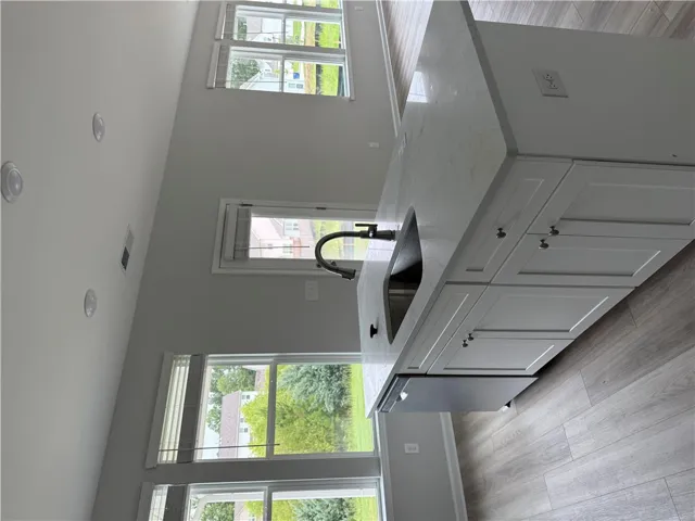 A well-appointed kitchen island offers generous counter space and seamless entertaining.