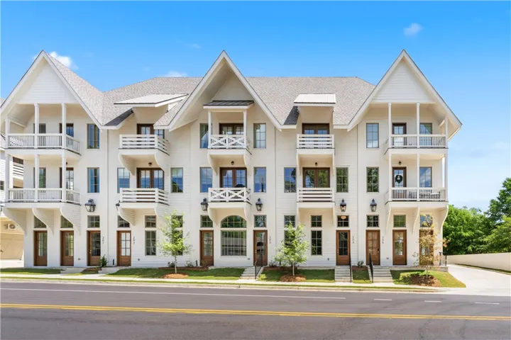 These modern homes feature balconies, inviting curb appeal, and ample outdoor living space.