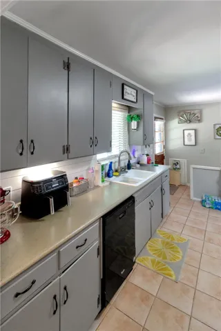 This kitchen offers ample storage and a functional layout, perfect for everyday living.