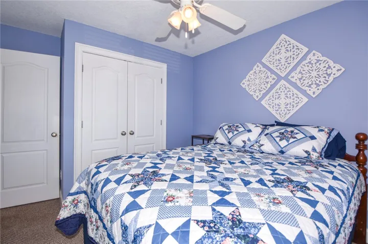 This cozy bedroom features thoughtful details and a comfortable atmosphere.