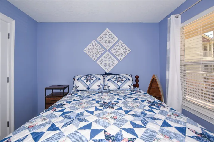 This cozy bedroom provides a comfortable and tranquil retreat for rest and relaxation.