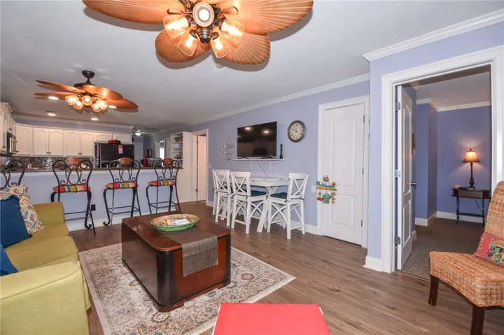 This inviting space offers an open concept, perfect for seamless living and entertaining.