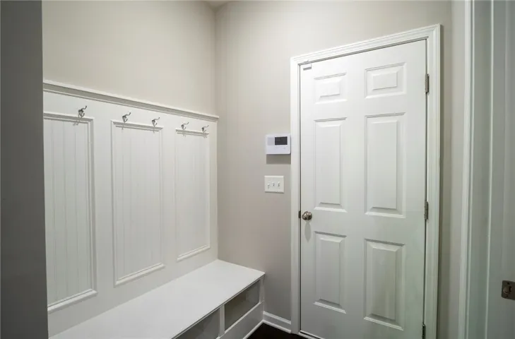 This organized entry offers convenient storage and a seamless transition into the home.