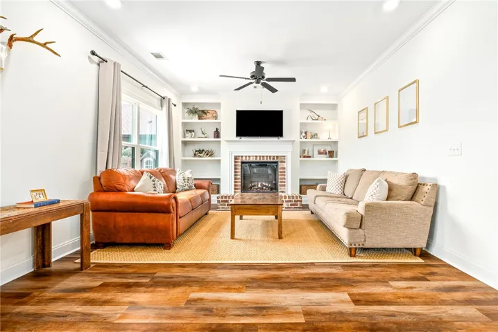 This living area features a warm fireplace, creating a cozy and inviting atmosphere.