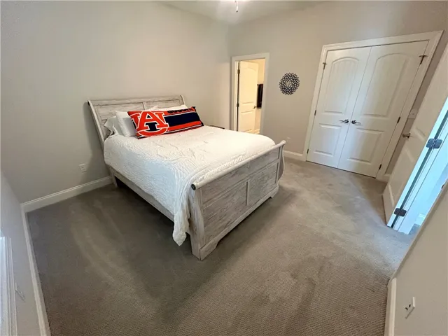 This spacious room provides a comfortable retreat with ample natural light.