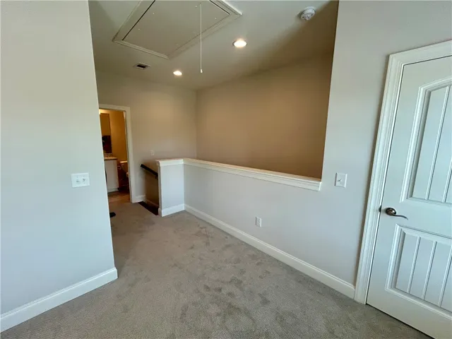 This versatile loft area offers a flexible space, perfect for various uses.