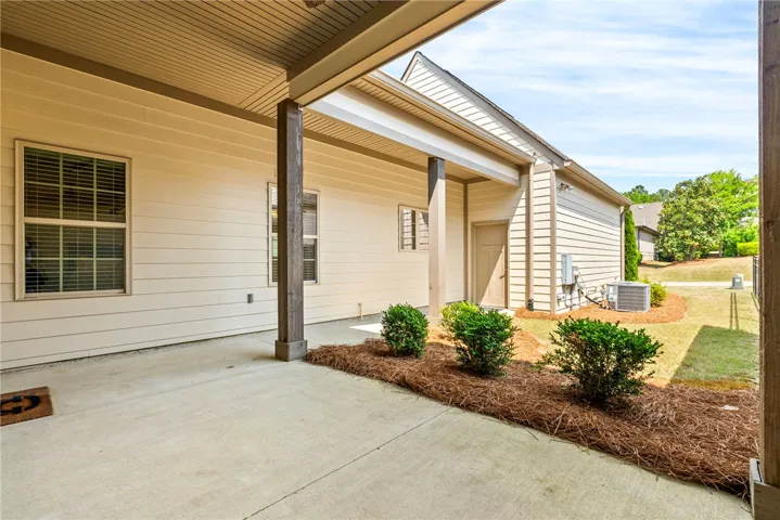 This inviting patio offers a tranquil retreat for outdoor enjoyment and relaxed gatherings.