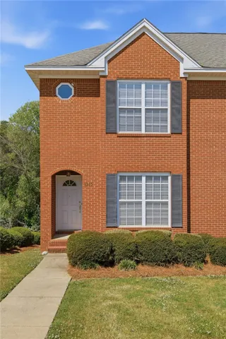 This classic brick exterior home offers timeless appeal and inviting curb appeal.