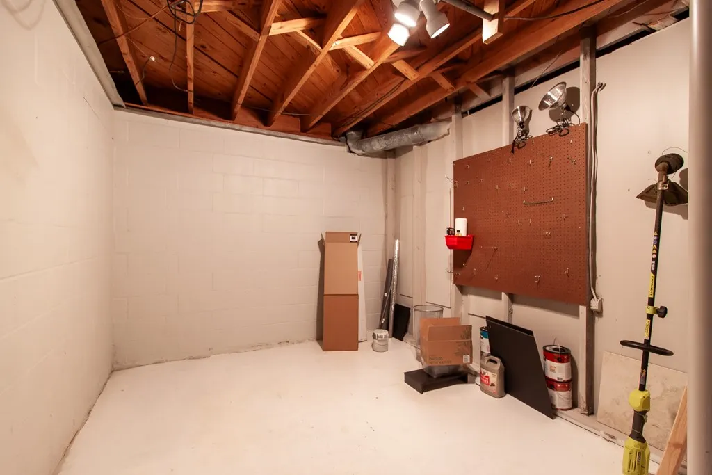 Unfinished basement space, ready for your customization and storage needs.