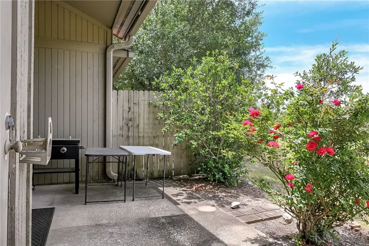 This private patio offers a serene outdoor space, perfect for relaxing or entertaining.