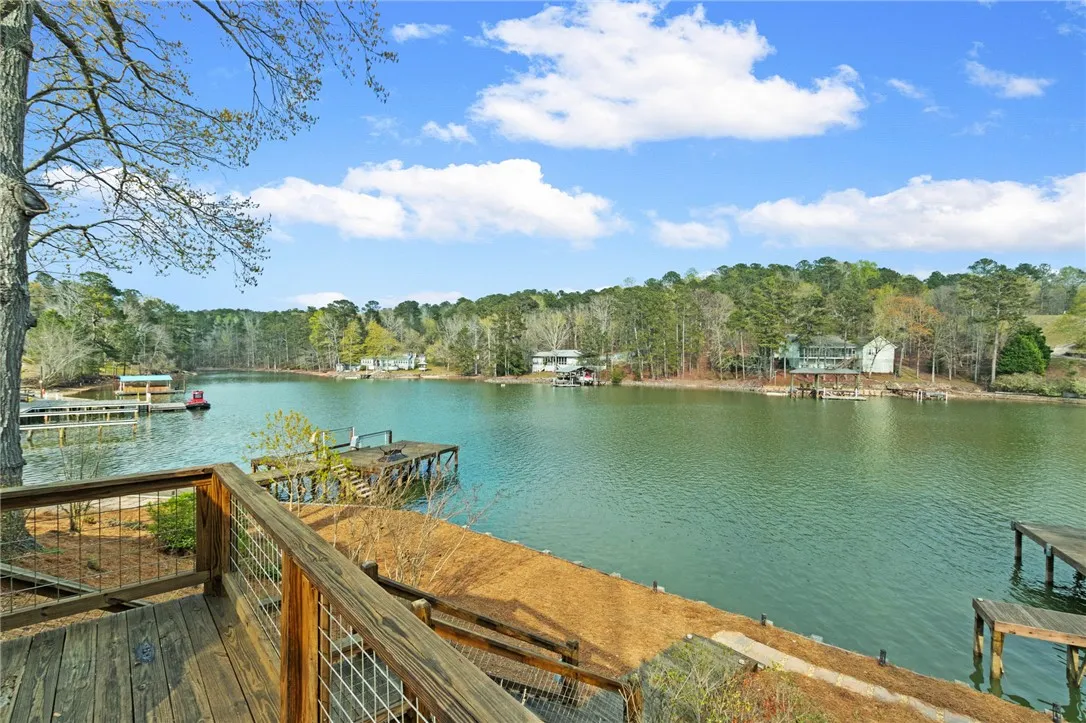 This lakeside retreat offers unparalleled waterfront access and scenic views.