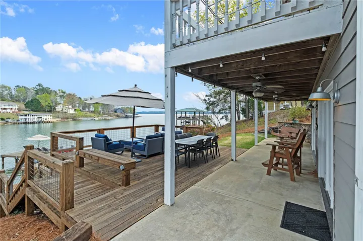 This captivating lakefront property offers expansive outdoor living with picturesque water views.