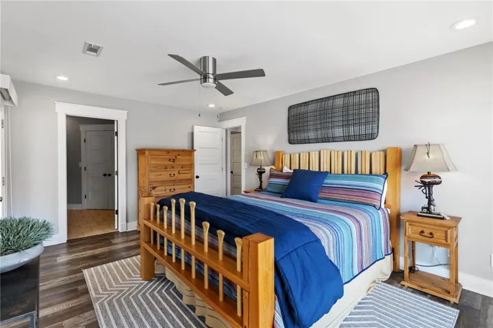 This cozy bedroom provides a comfortable retreat with ample space and modern amenities.