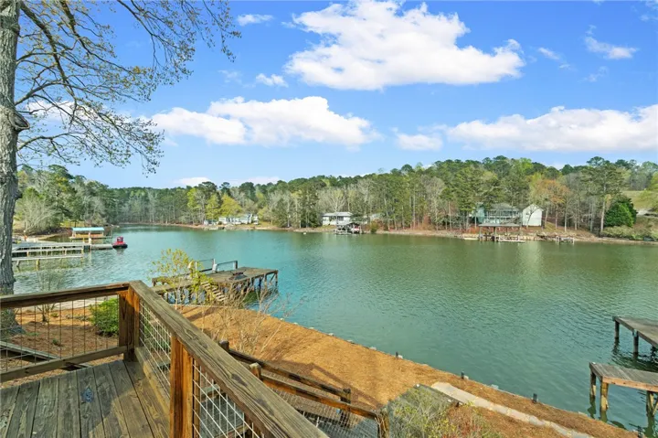 This lakeside retreat offers unparalleled waterfront access and scenic views.