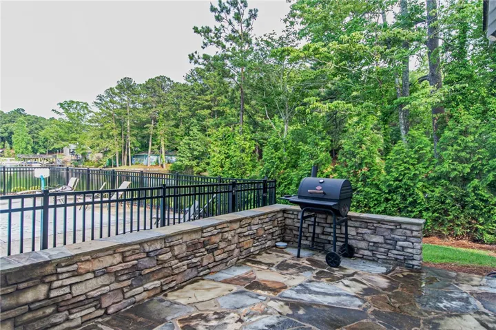 This patio offers an inviting outdoor space, perfect for entertaining with picturesque water views.