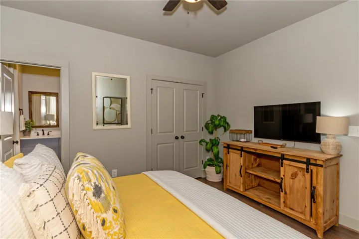 This cozy sleeping space features thoughtful details and a bright, inviting atmosphere.