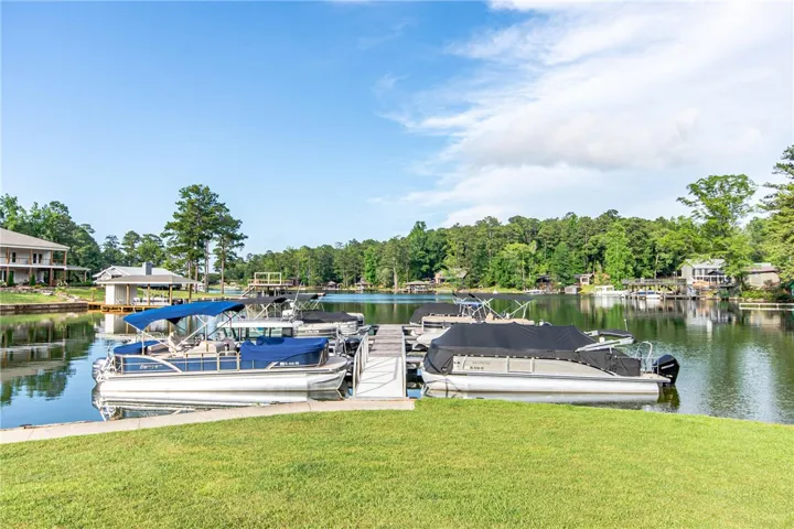 This tranquil waterfront setting offers direct access to a serene lake.