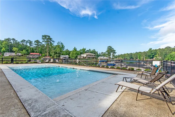 This inviting pool area offers relaxation and recreation with scenic views.