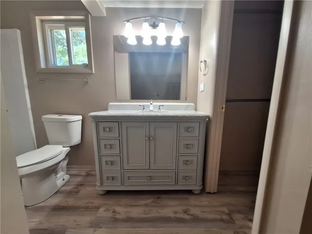 An inviting bathroom offers functional design and practical comforts for daily routines.