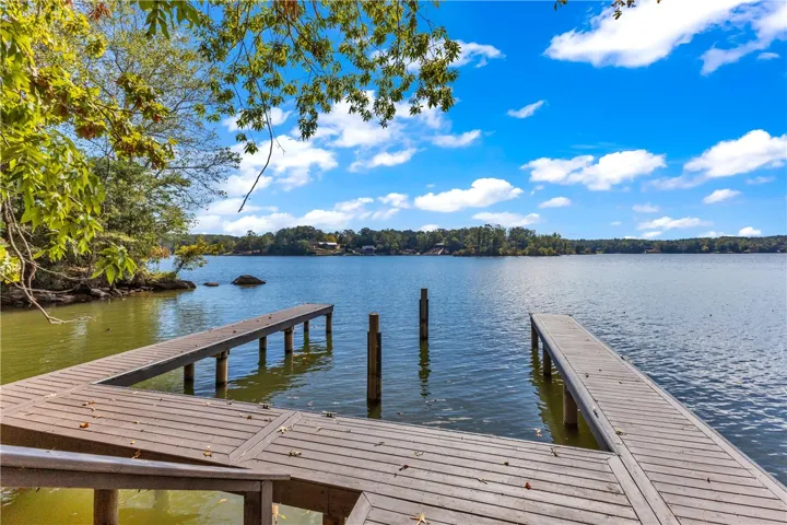 Boasting a private dock, this serene lakefront property offers tranquil waterside living.