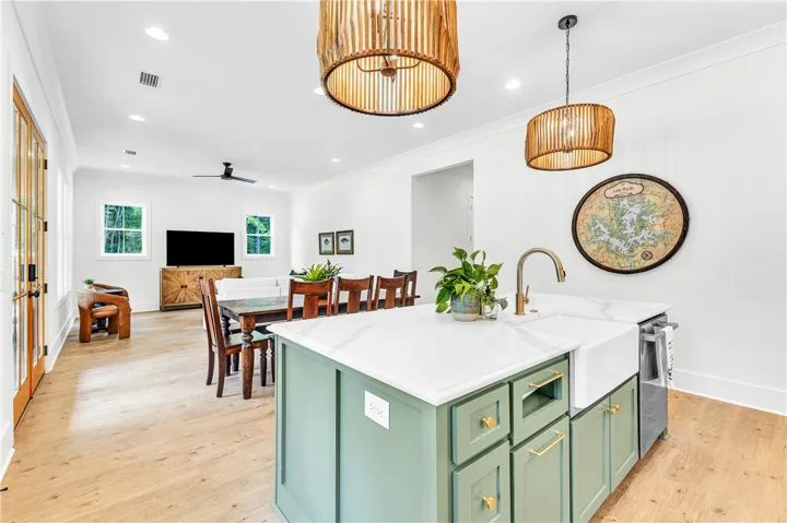 An inviting open-concept kitchen and living area flows seamlessly, perfect for everyday living.