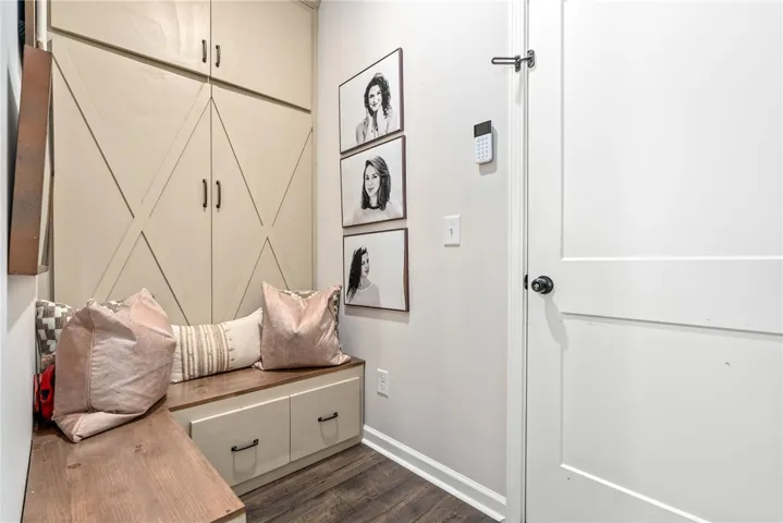 This built-in bench and storage system creates a functional and inviting entryway.