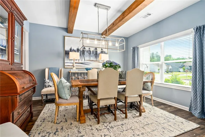 This bright dining area offers an inviting space for memorable gatherings.