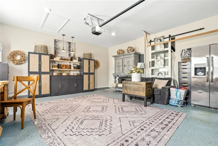 This versatile garage space offers ample storage, making it ideal for various activities and organizational needs.