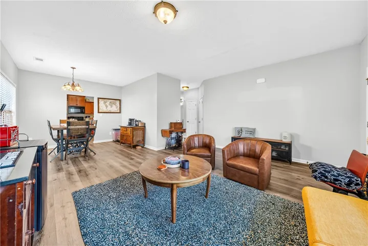This inviting space offers a seamless blend of comfort and functionality for everyday living.