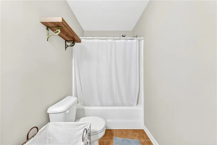 This bathroom showcases clean design with practical and enduring finishes.